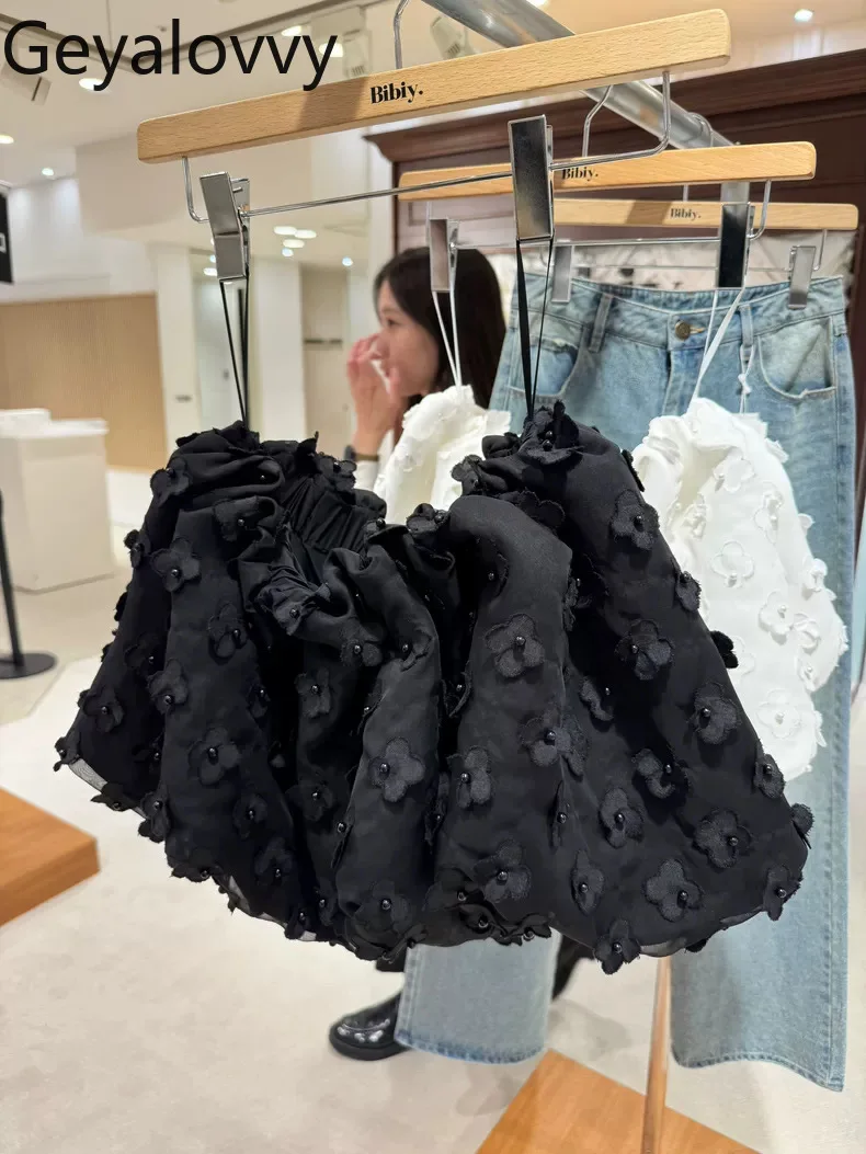Moda de cor sólida saias casuais para mulheres estilo japonês tridimensional flor cintura alta frisado bud saia curta femme