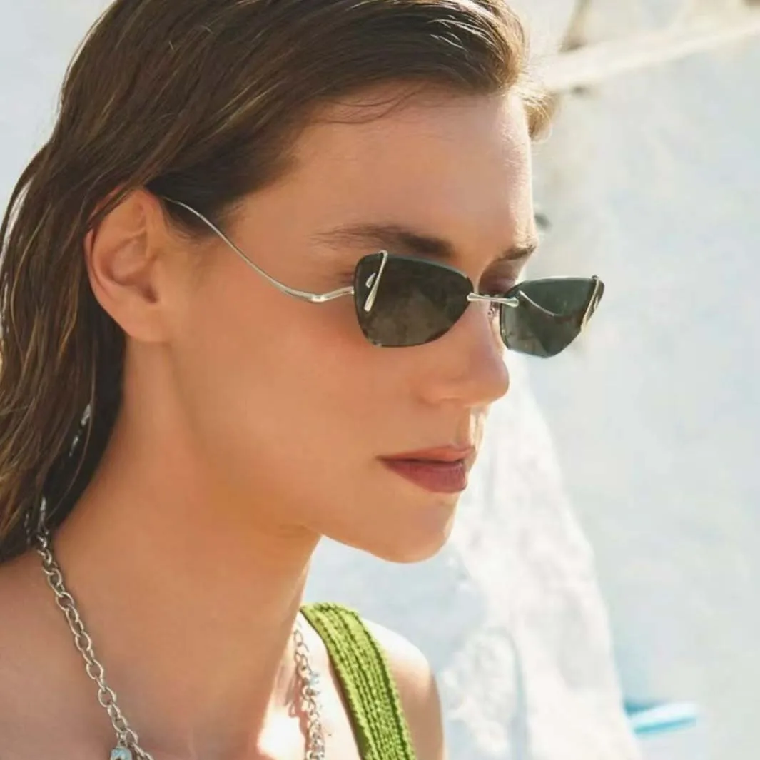 Oculos-de-sol-femininos-estilo-europeu-americano-design-gatinho-sem-aro-com-borda-cortada-modernos-e-na-moda-para-uso-externo