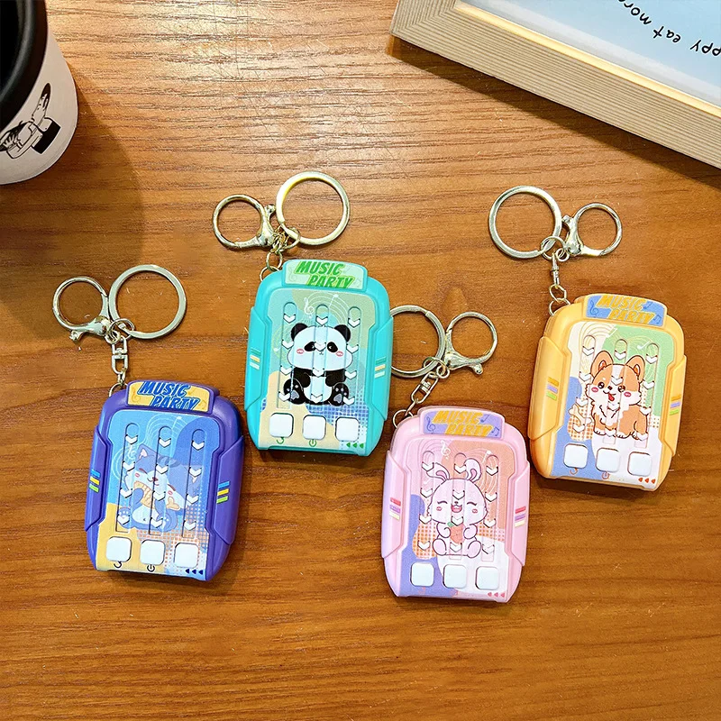 การ์ตูน Rhythm Master เกมเครื่อง Breakthrough ความเครียดบรรเทาของเล่นปริศนาบีบปุ่มเต้นรําเครื่องพวงกุญแจจี้