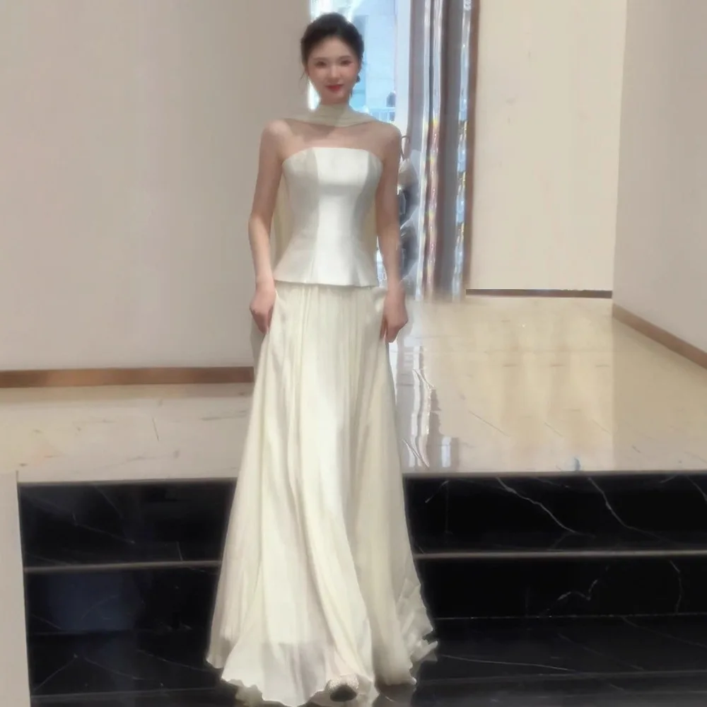 Elegante trägerlose Korsett-Brautkleider in Beige, ärmellos, bodenlang, hübsche plissierte Prinzessin-Brautkleider, Party-Frauen-Braut