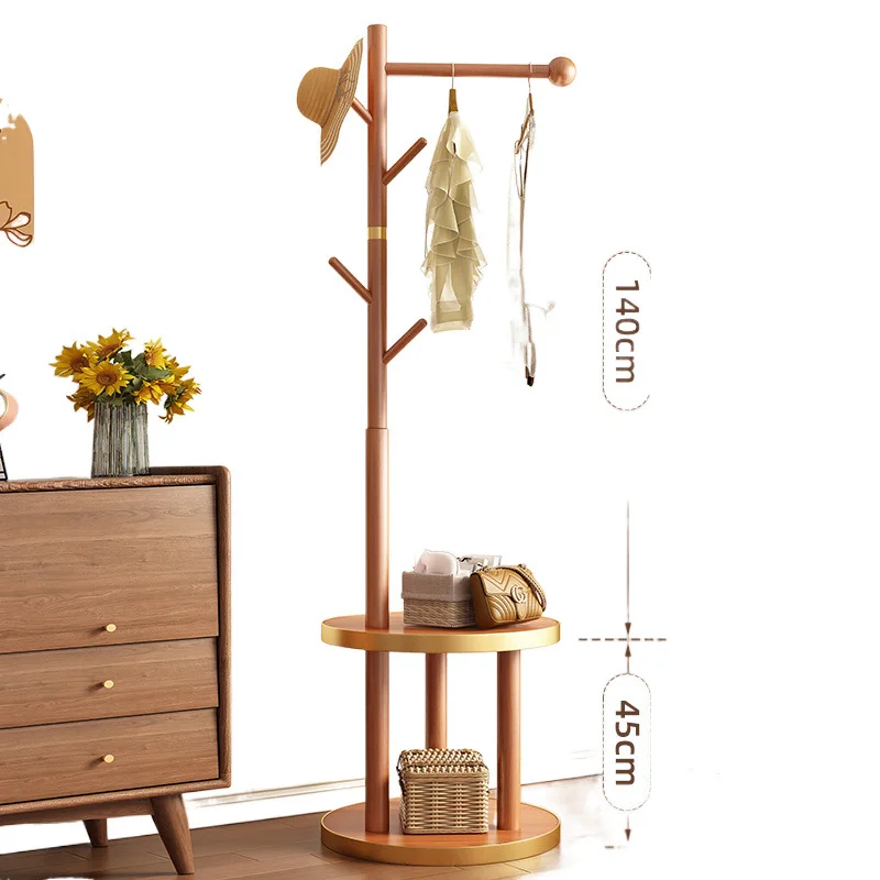 

Solid wood coat rack floor-to-ceiling hanger lying on the bed with clothing artifacts living room vertical