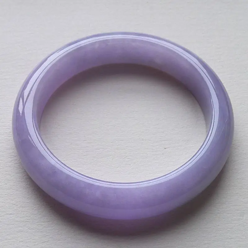 Delicate, Burmese bracelet for women featuring a smooth icy texture and a purple jade color