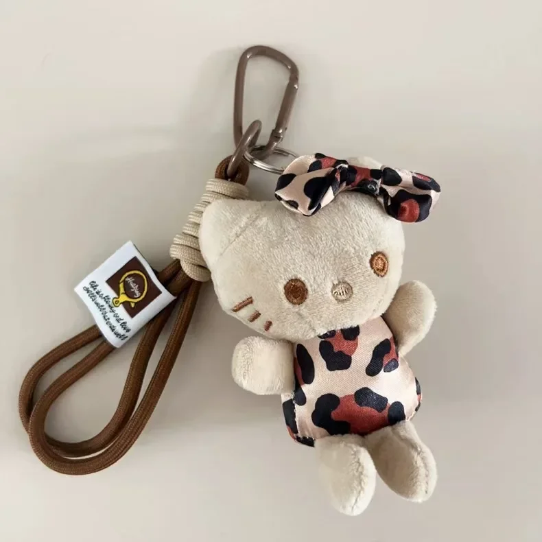 Kawaii bonito sanrio leopardo impressão olá kitty boneca de pelúcia charme chaveiro anime dos desenhos animados kt gato sacos pingente brinquedos presente da menina