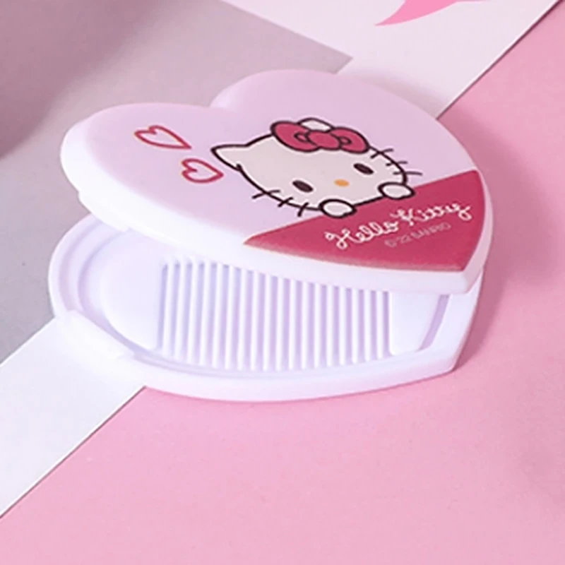 Sanrio Hello Kitty My Melody specchio pieghevole a doppia faccia pettine a specchio portatile carino Mini specchio per il trucco integrato regali