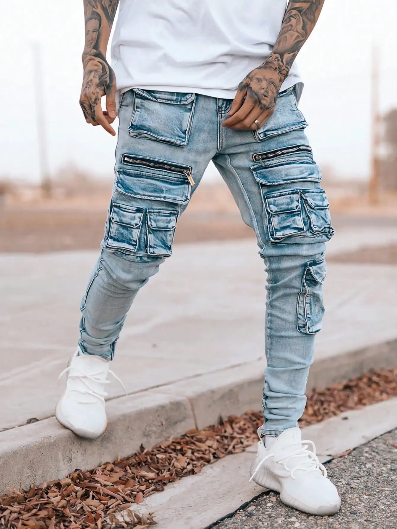 Men’s streetwear, multi pocket vehicle, snug, stretchy, light-colored jeans.