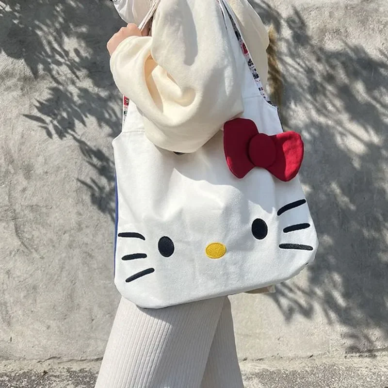 Sanrio olá kitty bolsa de ombro nova lona grande capacidade sacola dos desenhos animados bonito bolsa de armazenamento da menina saco de compras