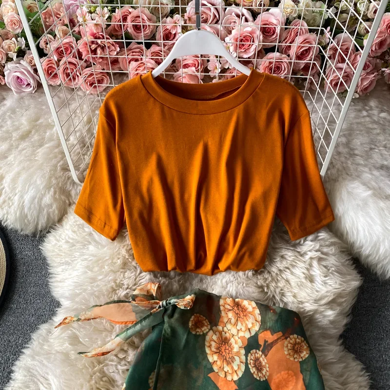 Conjunto de dos piezas para mujer, falda de playa estampada con abertura de cintura alta y manga corta, camiseta naranja con cuello redondo, verano 2021