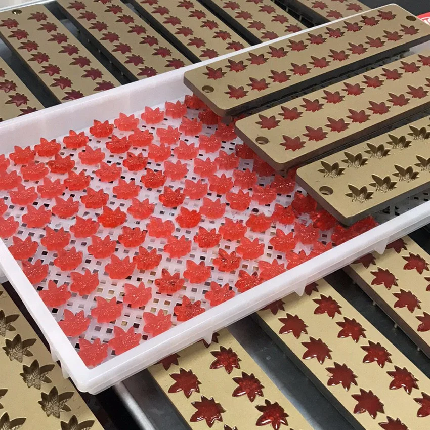 Armazenamento de doces com controle automático para produção de pirulitos e ursos de goma