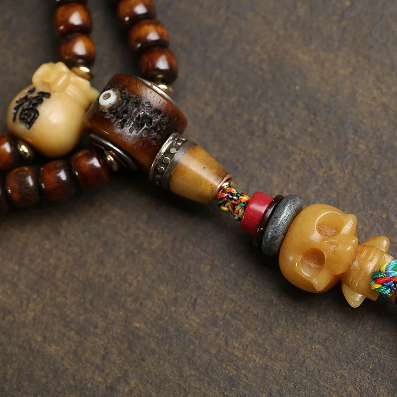 108-bead Buddhist necklace made of Yak bone turquoise with copper clasp and Pixiu pendant
