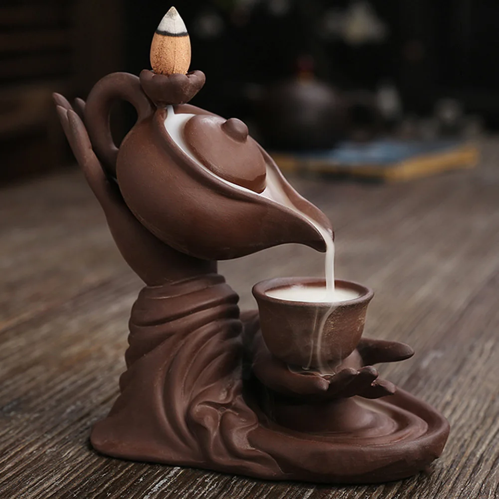 Pot suspendu à la main de bouddha, brûleur d'encens, effet de fumée à reflux affascinant pour coin de méditation