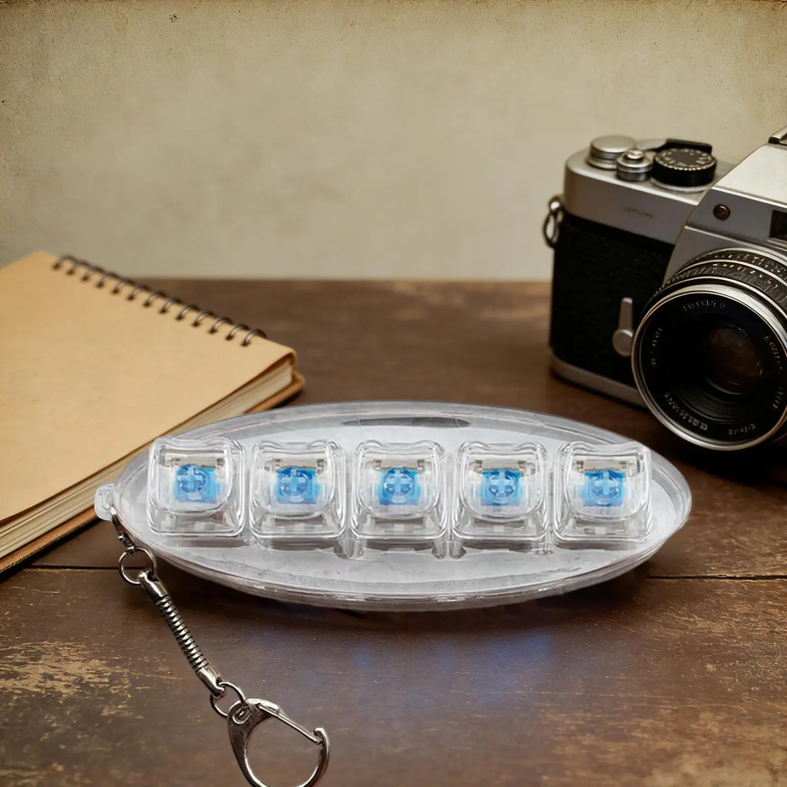 Tastiera da dito giocattolo meccanico portatile calma tastiera a 5 tasti portachiavi Fidget per donne adolescenti amici adulti viaggi a casa