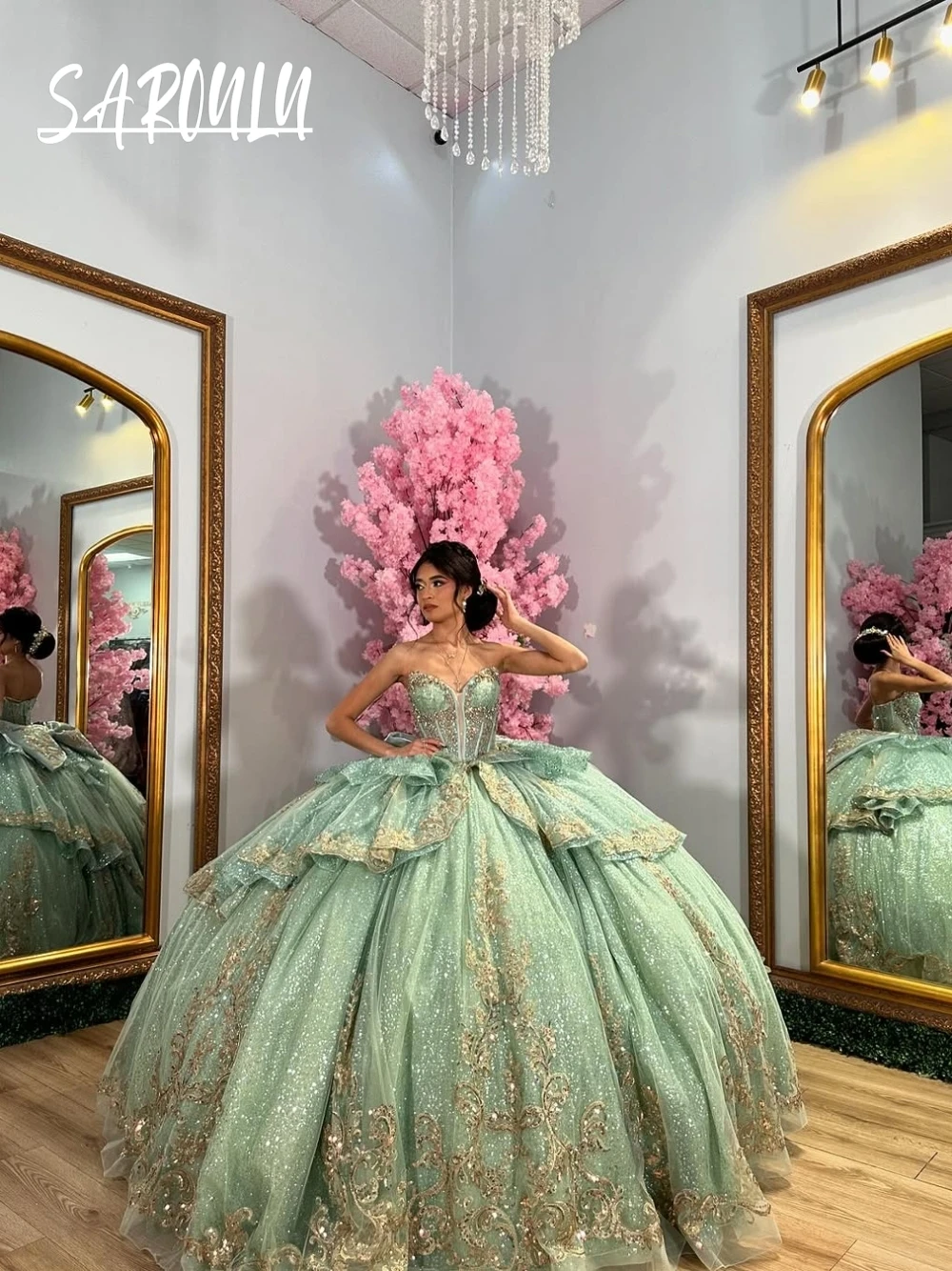 

Mint Green Celebrity Quinceanera Dress Sweet Bow Dazzling Pleated Ball Gown For Girls Charming V Neck Customized Evening Wear
