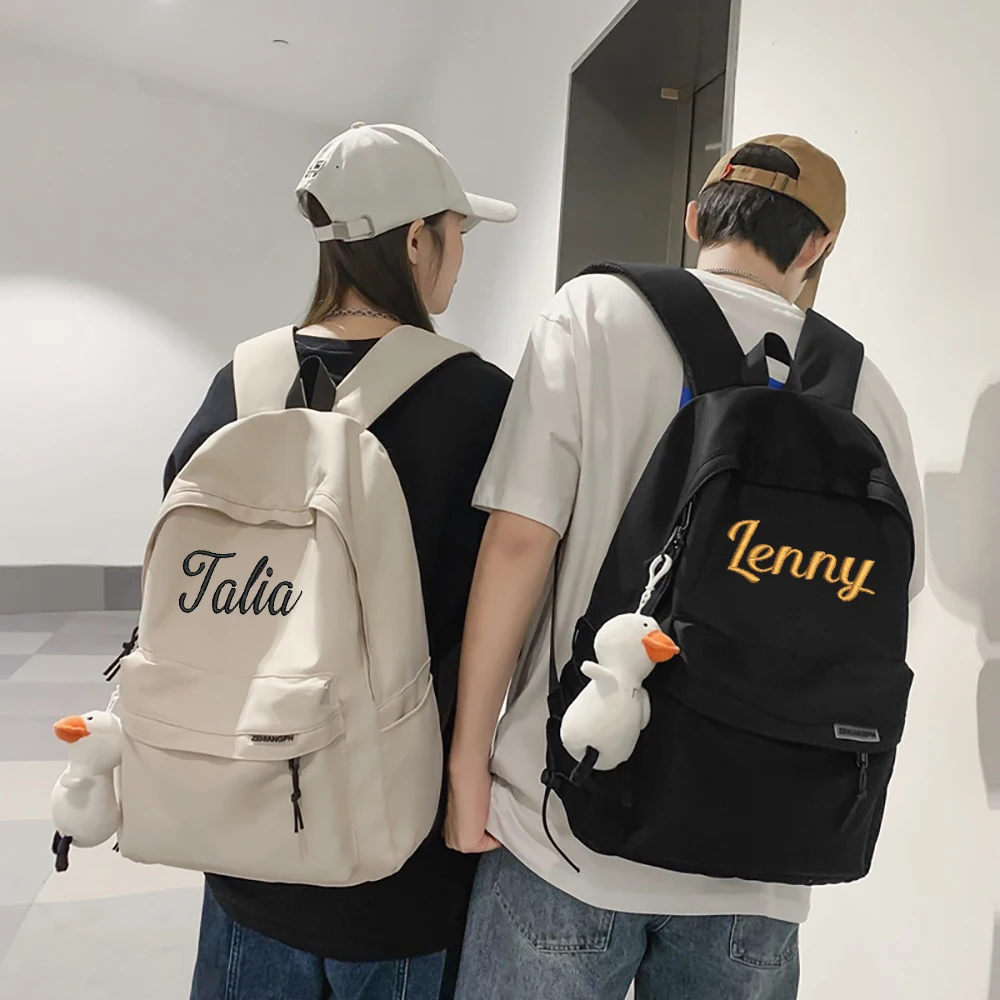 

Large Capacity Korean Style Backpack, Embroidered Schoolbag For Male And Female Students, Versatile Solid Color Commuter Bag