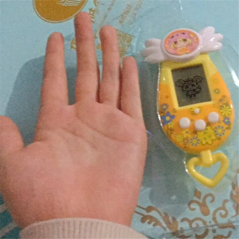 Tamagotchi máquina electrónica de elfo para mascotas, máquina de cría de elfo de luna de ensueño para niñas, versión Popular, regalo nostálgico, juguete Virtual para niños