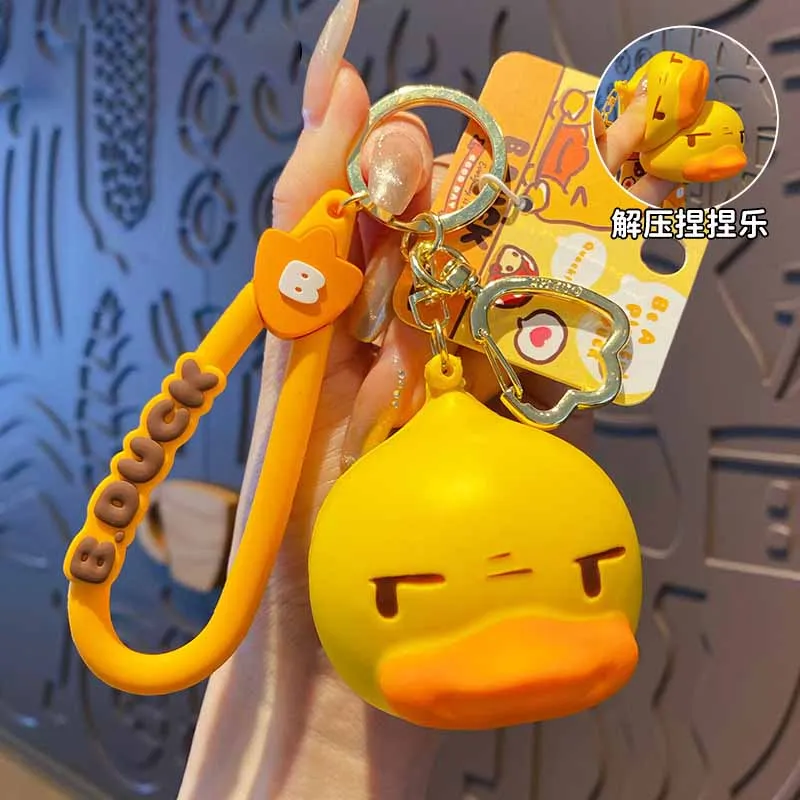 Cute Little Yellow Duck Soft PU Slow Rebound Toy Chaveiro Pingente, Brinquedos de descompressão, Fun Pinch Music Fidget Toy para crianças, Novos desenhos animados