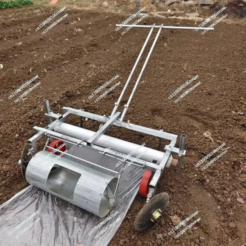 Manual miniature agricultural mulching machine, plastic film laying machine, roller-type mulching machine.