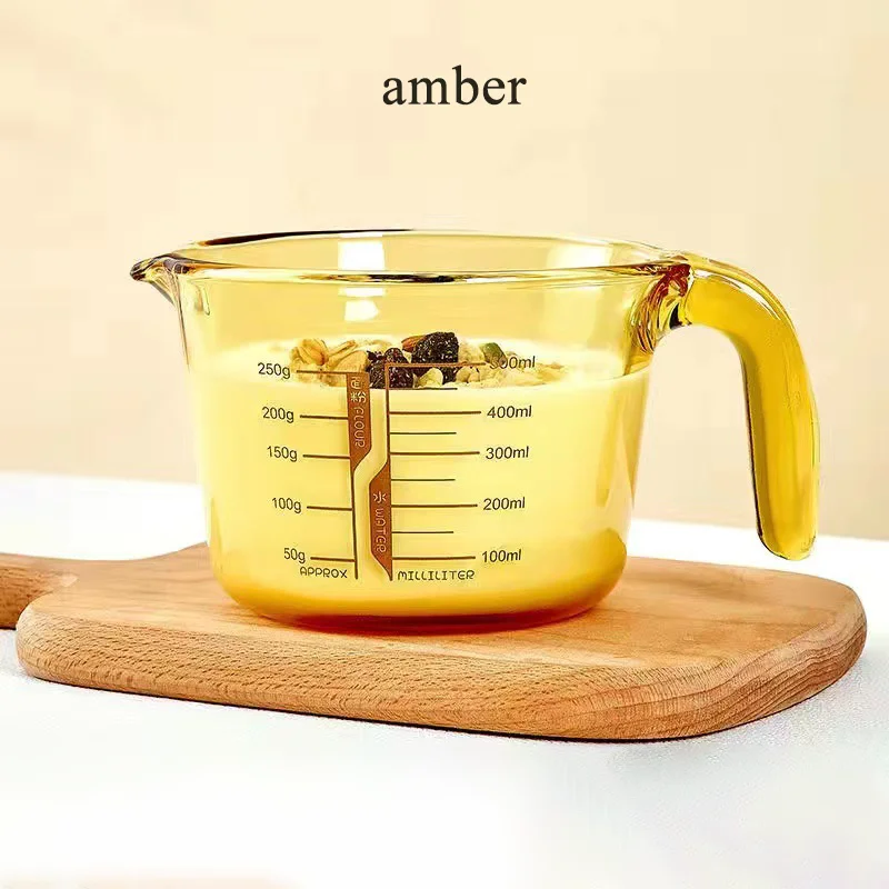 

Thickened glass measuring cup with scale amber cartoon handle，Borosilicate glass measuring cup with graduated handle，Milk cup