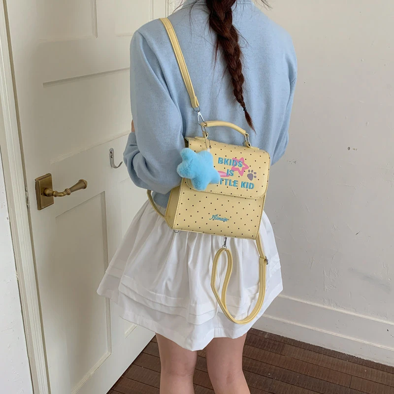 

Mint green polka dot backpack for women2026New versatile daily commuter and travel backpack mini bag
