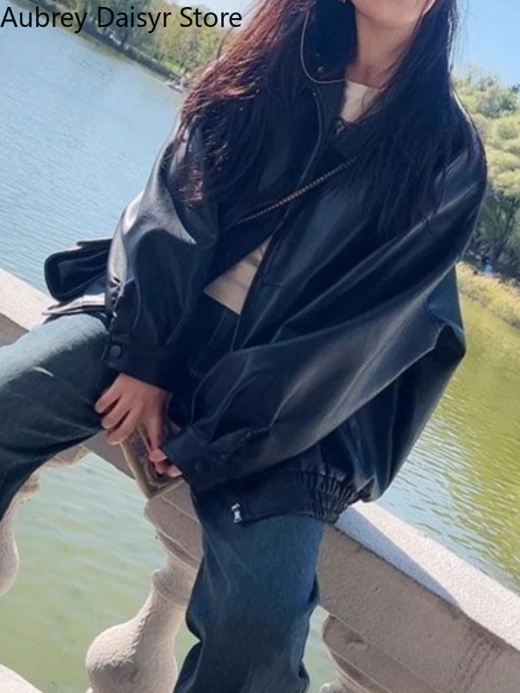 สีดําหลวมซิปเสื้อหนังยาวผู้หญิง Retro Casual Punk แจ็คเก็ตหนังเกาหลี High Street Moto Biker แจ็คเก็ตหนัง 2025