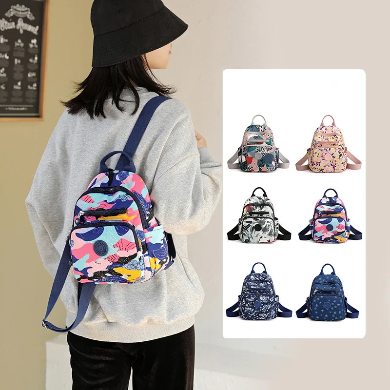 Mochila pequeña de diseñador para mujer, bolso de hombro de viaje, de alta calidad, a la moda, para adolescentes, novedad de 2024