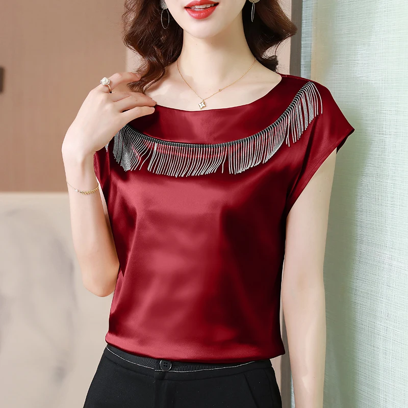 Temperamento elegante cuello redondo Color sólido verano nueva moda mujer versátil satén borla murciélago manga corta Camisetas Tops