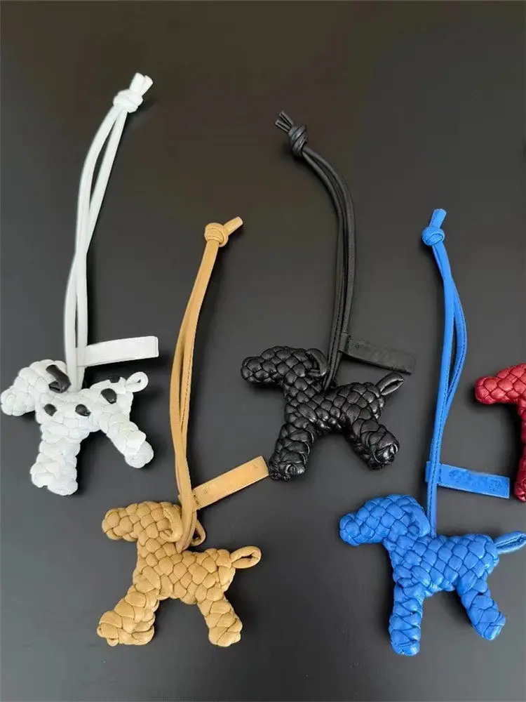 

Luxury Woven Dog Bag Charm Leather Handmade Leather Strap Keychain Creative Doll Car Hanging Strap