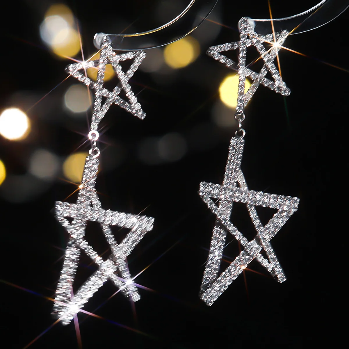 Source: Fashionable ultra-shiny long five-pointed star earrings for women, elegant luxury stud earrings wholesale from manufactu