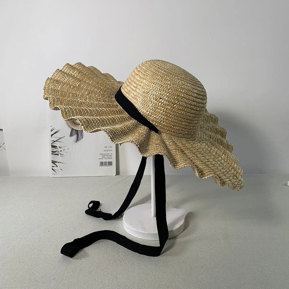 Summer 2024 Women\'s uv protection, large eaves sunscreen straw hat, fashionable western wave belt, wavy beach holiday hat