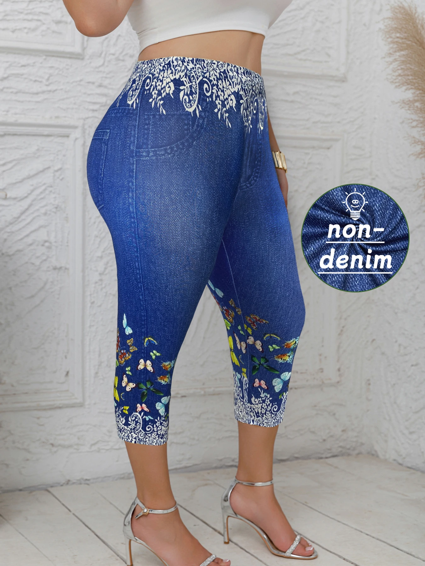 Damskie legginsy Capri w dużych rozmiarach z wzorem motyla Dżinsowy nadruk Wygodne, rozciągliwe modne, swobodne spodnie z dzianiny do połowy łydki