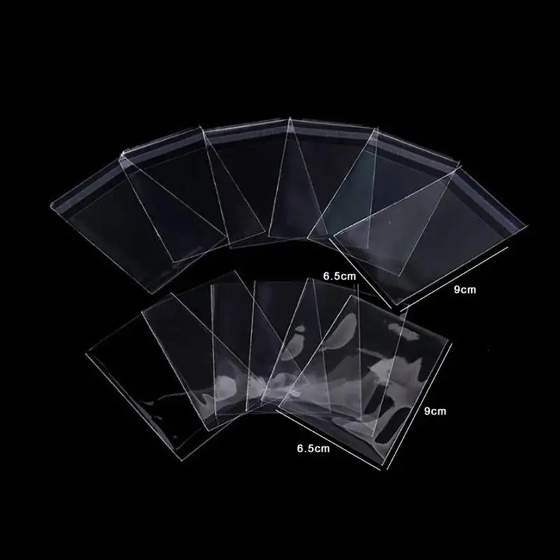 200 buah (2 pak) 65*90mm pelindung kartu lengan kartu pembunuh ajaib dari Tiga Kerajaan sepak bola Kartu Bintang Permainan papan transparan