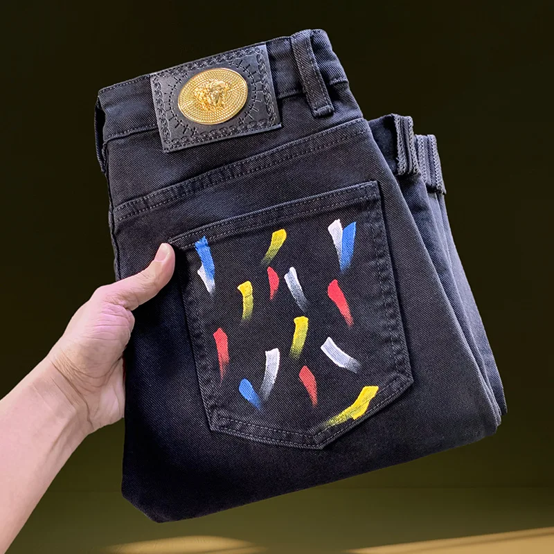 

Graffiti printed black jeans for men 2025 new style, light luxury high-end men's clothing trend, small footed denim pants