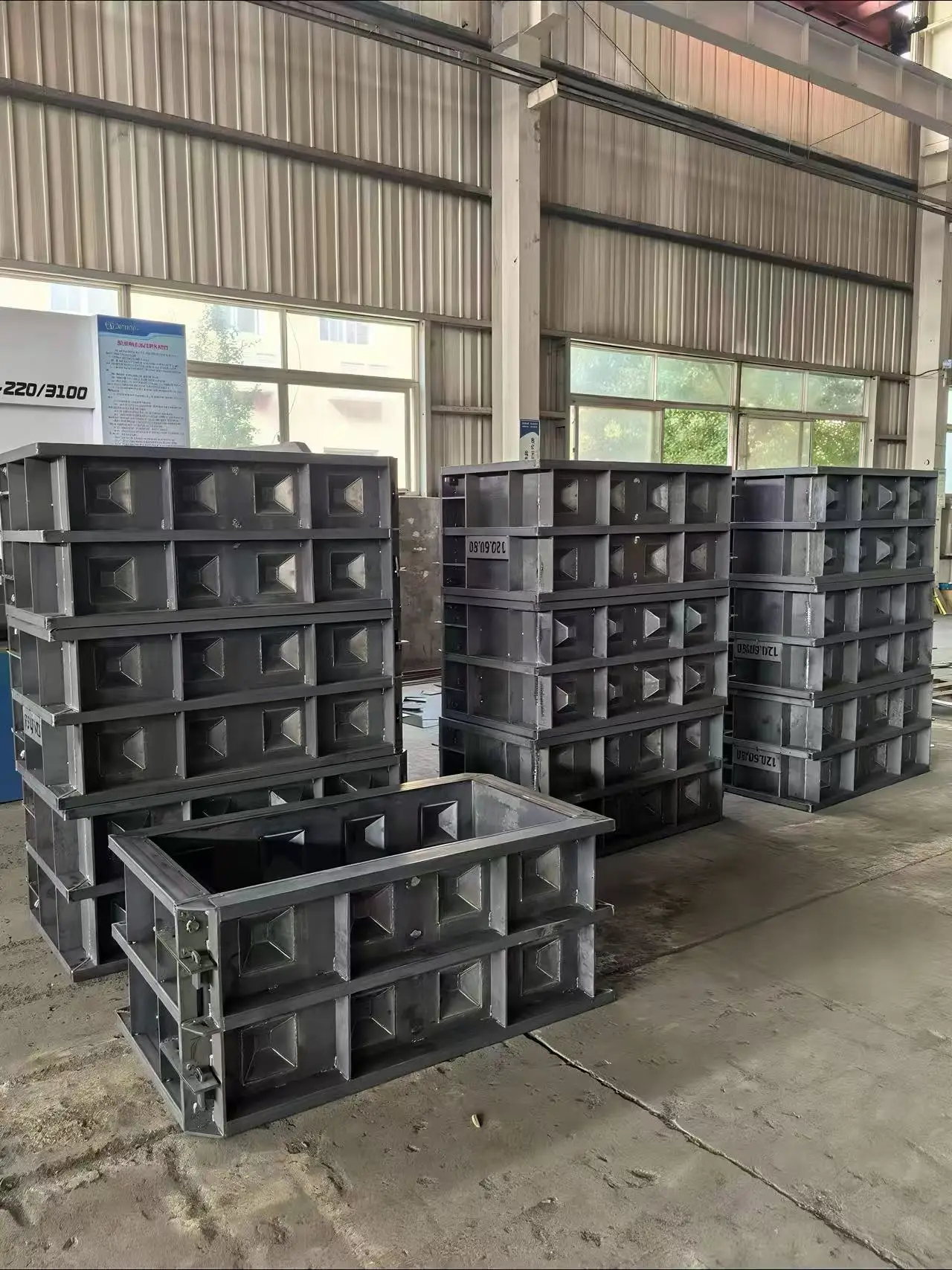 Permanent retaining wall solution - cost-effective pre-fabricated steel Lego concrete block moulds