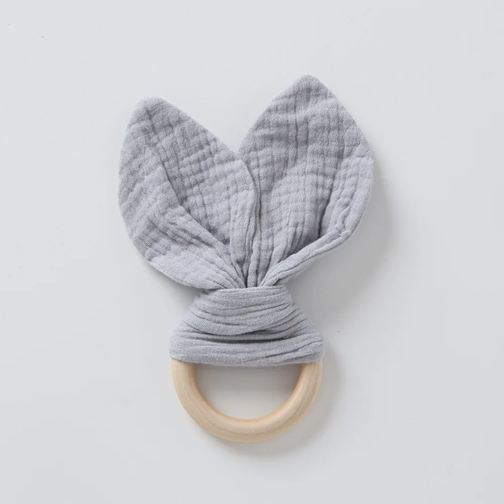 

Soft Baby Wooden Hand Grasp Natural Wooden Rabbit Ears Newborn Teething Ring Bracelet Rattle Sensory Chewing Appease Infant