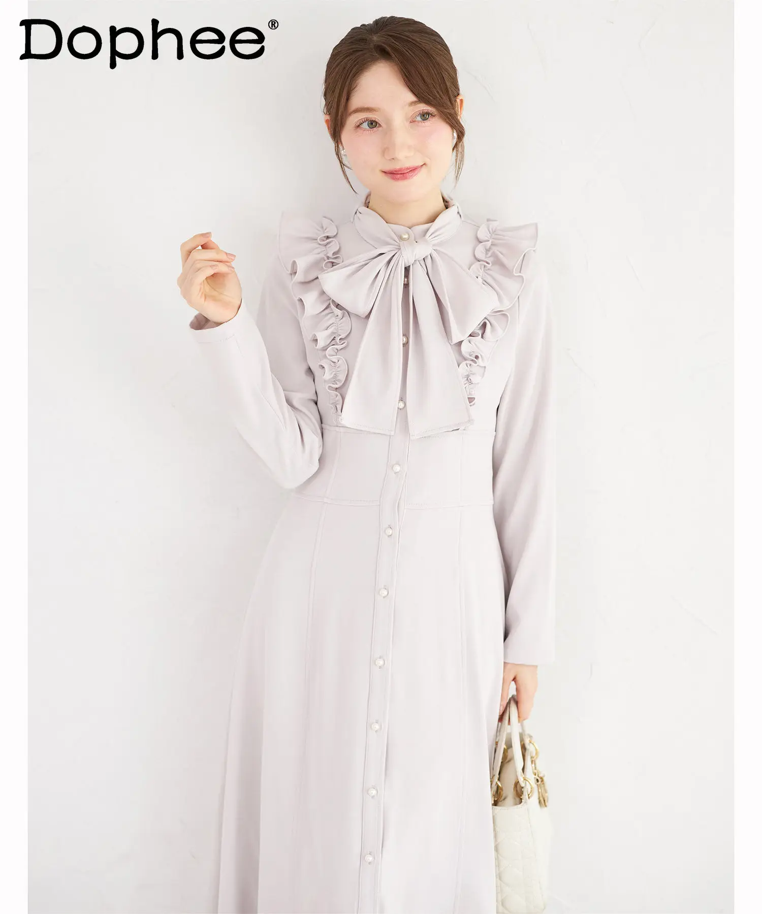 

2026 Spring and Autumn New Japanese Sweet Girl Bow Long Sleeve Dress Pearl Button Ruffle Waist-Cinching Long Dress