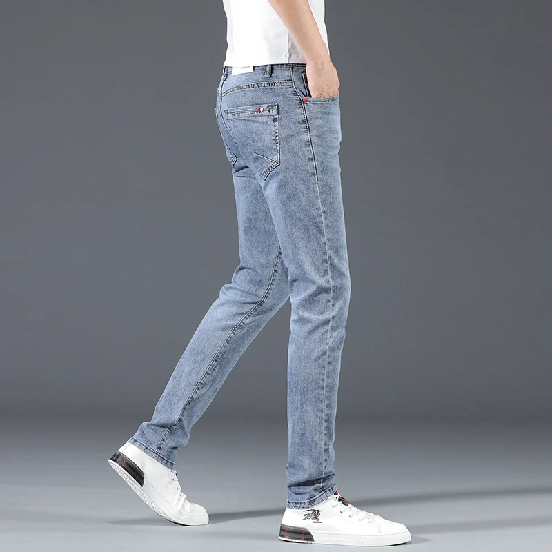 Pantalones vaqueros elásticos para hombre, Jeans ajustados de algodón, clásicos e informales, color azul claro, moda coreana, 2024