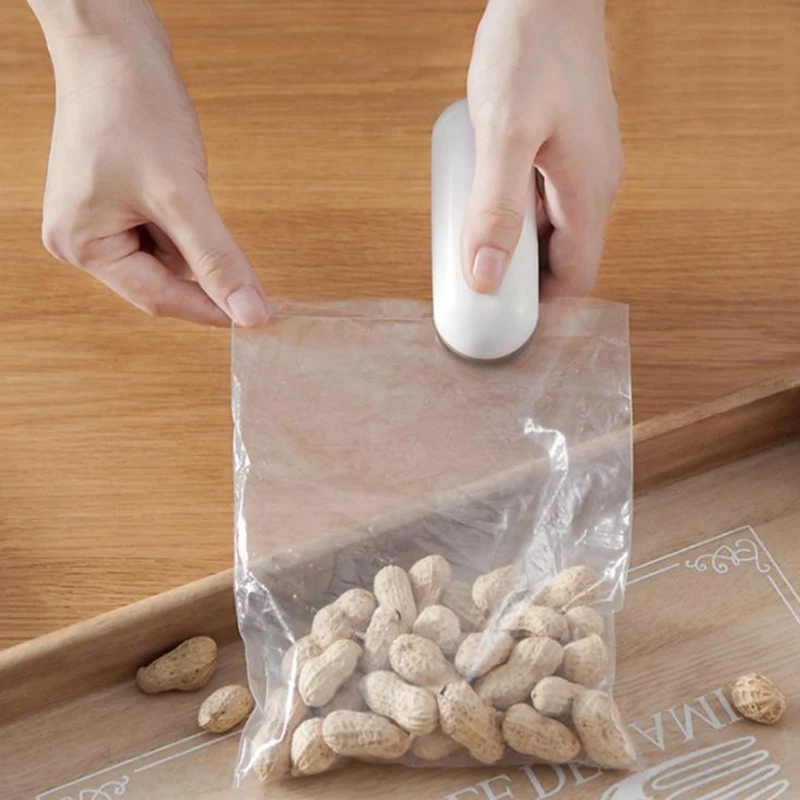 Mini sellador de bolsas portátil, máquina de sellado al vacío de alimentos de calor de mano, almacenamiento de patatas fritas, bolsas de galletas duraderas