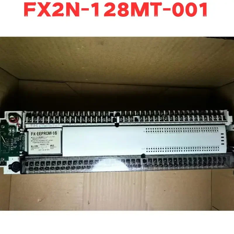 Second-hand FX2N-128MT-001 FX2N 128MT 001 PLC Tested OK