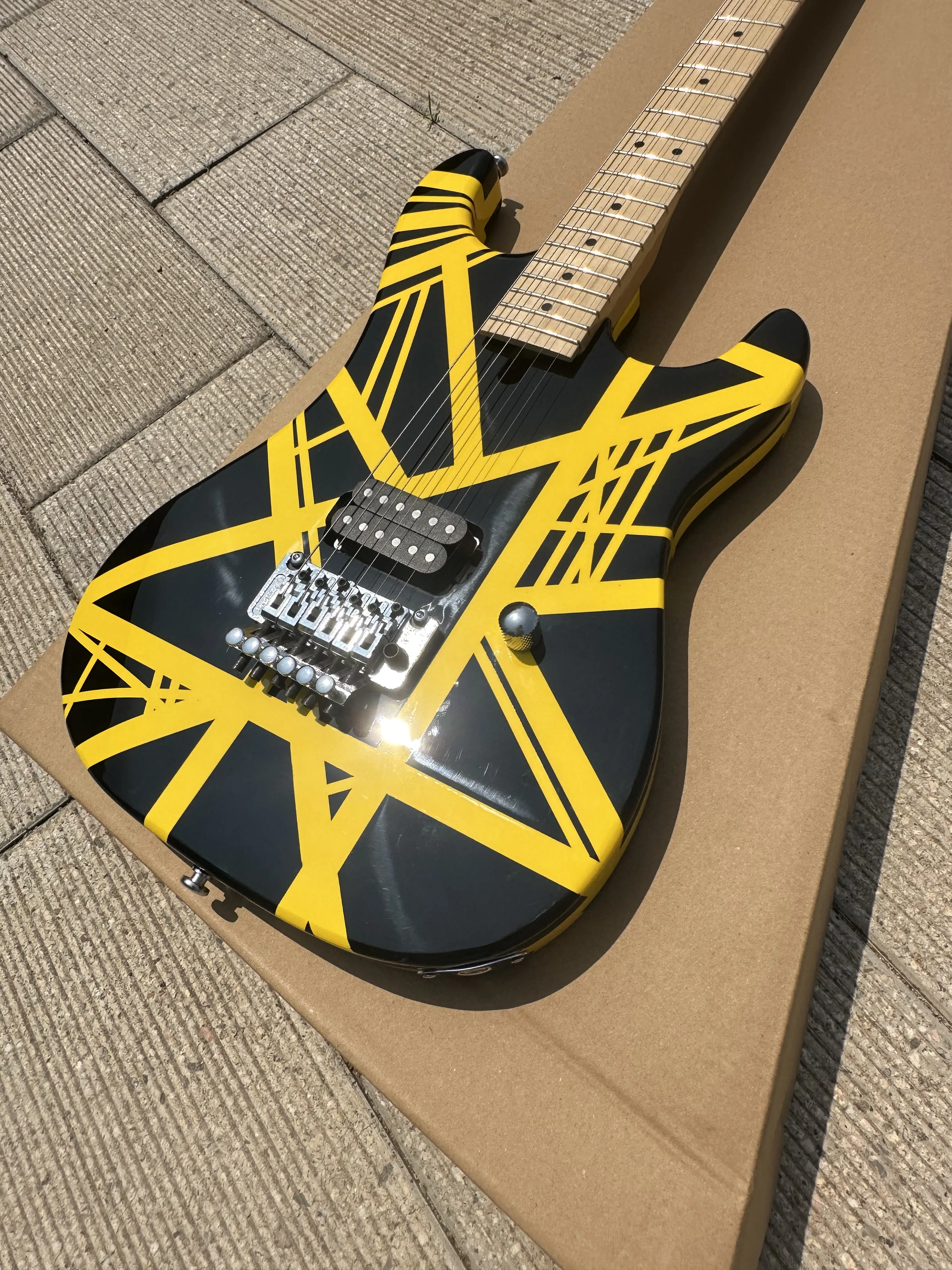 5150 electric guitar, imported alder body, Canadian maple fingerboard, signed, classic yello and white stripes, lightning packag