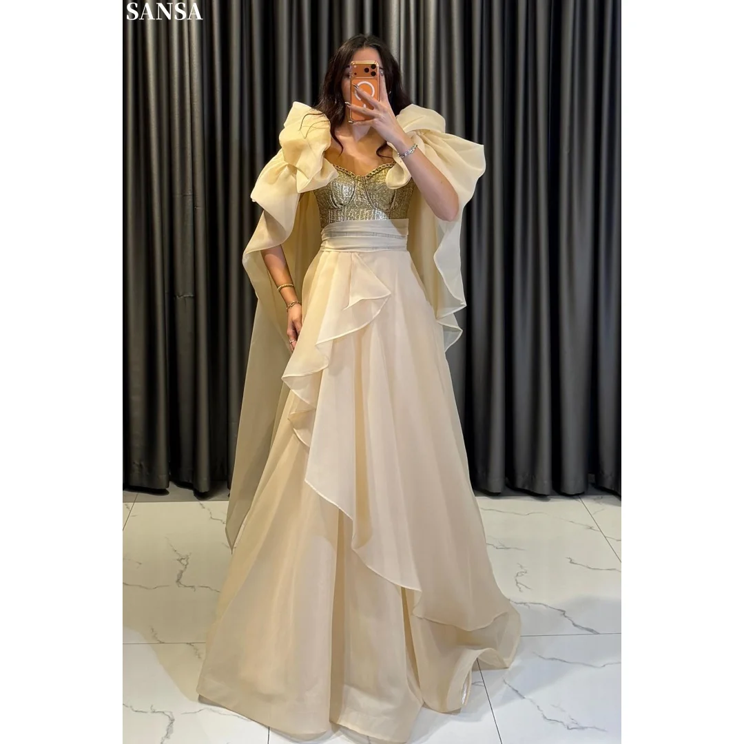 

Sansa Customized 2026 Luxury Champagne Chiffon Ball Gown with Gold Beaded Bodice and Cape Sleeves Formal Evening Prom Dress