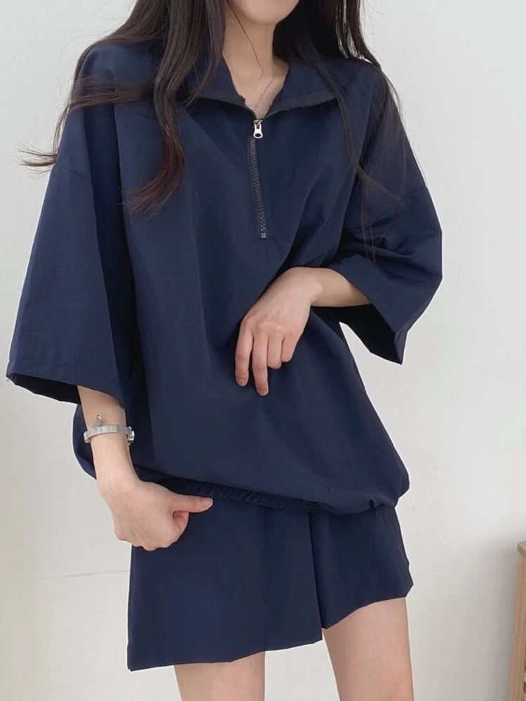 Conjunto de ropa deportiva informal a la moda, conjunto de dos piezas de plones cortos de pierna ancha con capucha y crem...