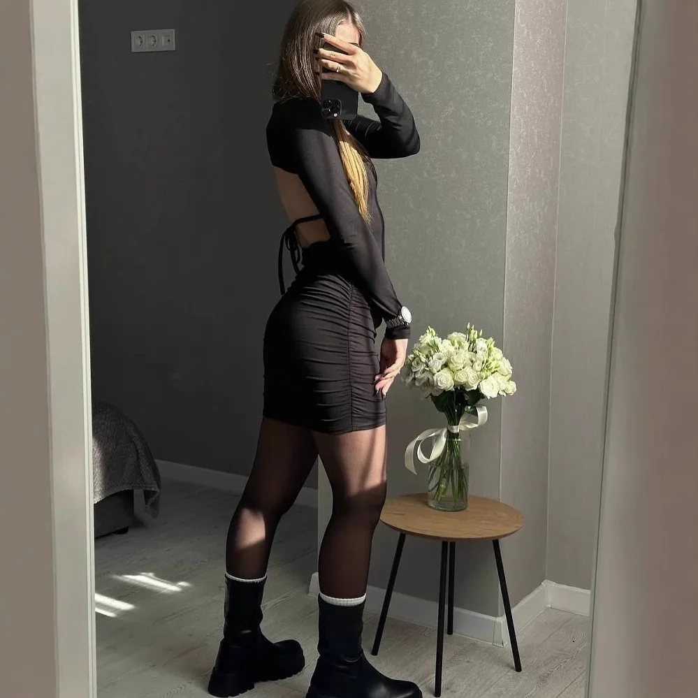 أوروبا والولايات المتحدة فتاة ساخنة الرياح الظهر جوفاء فستان بأكمام طويلة الإناث جولة الرقبة مثير ضئيلة طويلة الورك تنورة الإناث #2