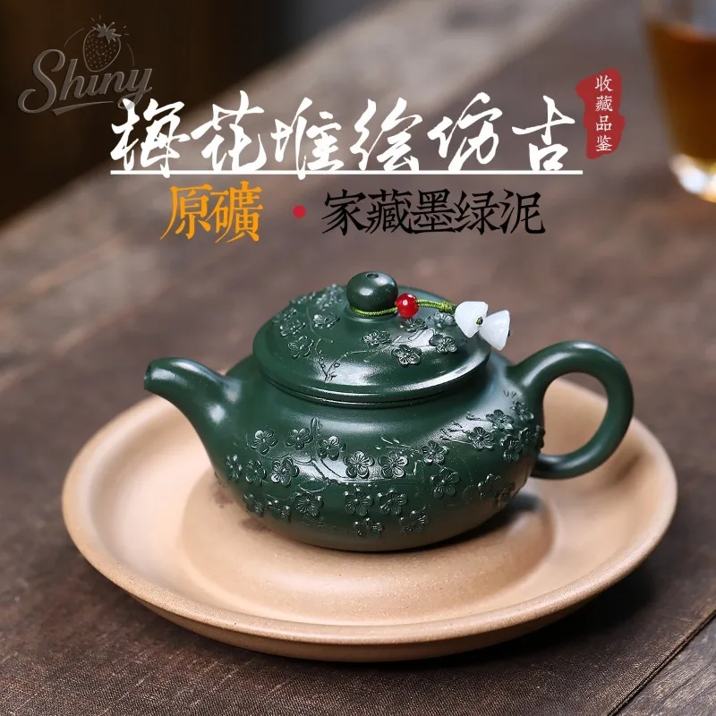 

Yixing Zisha Teapot Handcrafted From Premium Green Clay with Hand-Painted Plum Blossom Design in Antique Style