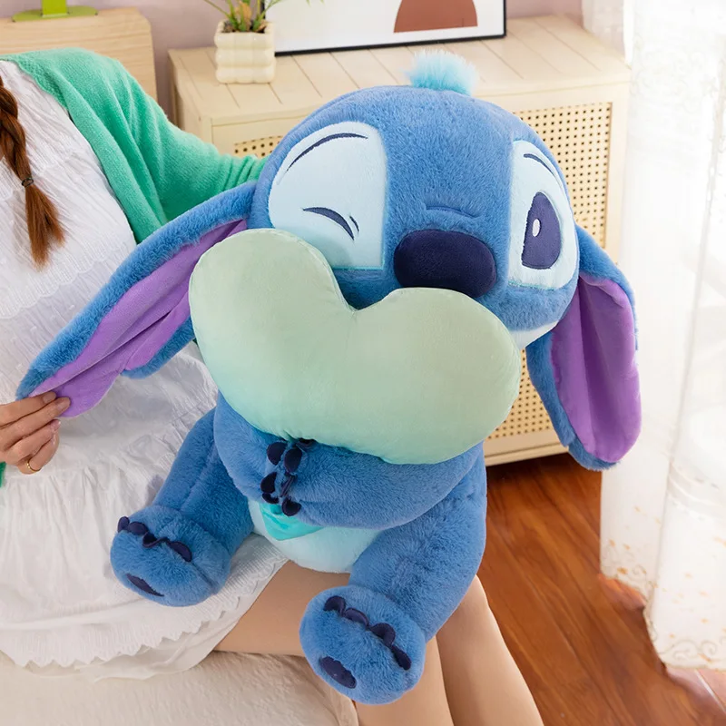 Peluche ripiene Kawaii simpatico cartone animato punto che abbraccia il cuore bambola angelo riempimento regalo di compleanno per bambini gioco di redenzione del premio di peluche