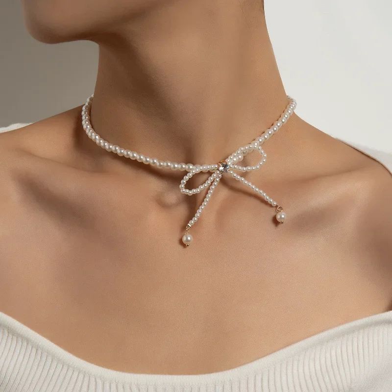 Collar elegante con lazo de perlas de imitación para mujer, gargantilla con lazo de perlas de imitación simples, collar con borlas geométricas estéticas