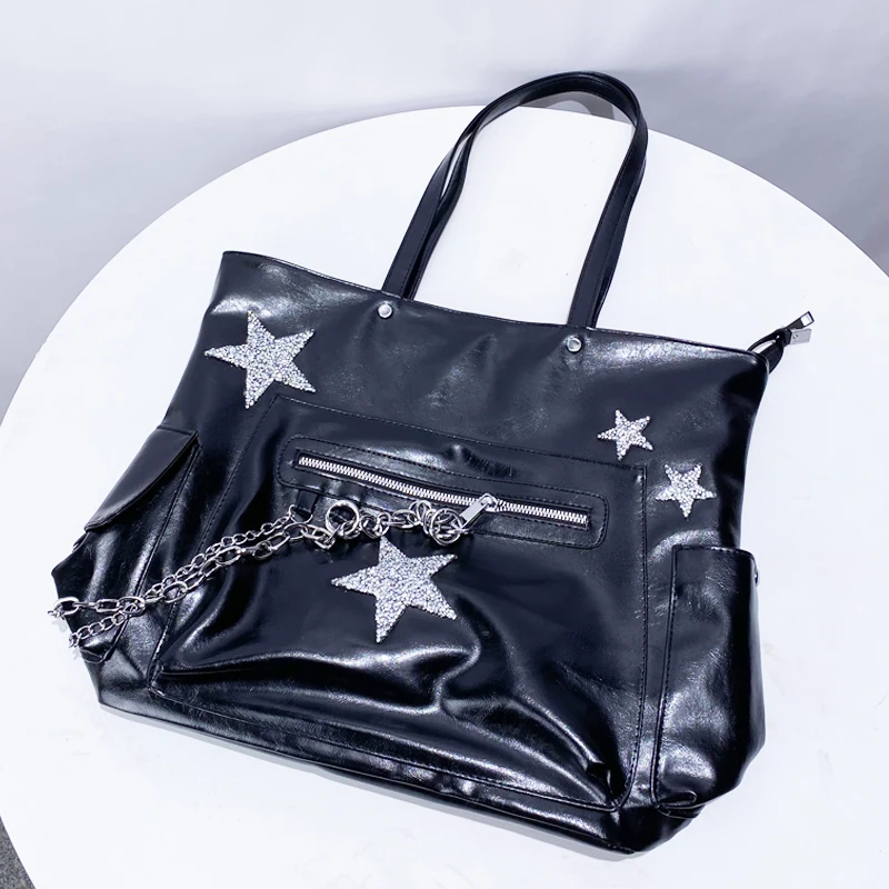 Estrella de cinco puntas Y2k Bolsas de asas de gran capacidad para mujeres Bolsos y monederos de diseñador de lujo 2024 Nuevo en PU Cadena de remaches de moda decorar hombro Envío gratis llegada rápida