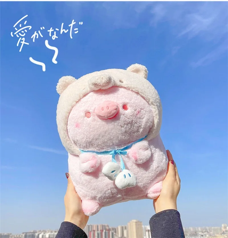 Une peluche cochon douce et paresseuse, ce ami câlin porte que des beaux rêves et des câlins confortables comme cadeau d'anniversaire