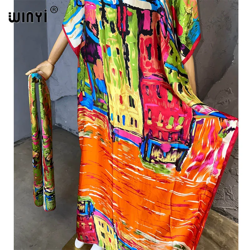 WINYI 2023 nowa afrykańska muzułmańska pani lato Boho nadrukowane Graffiti Kaftan sukienka na wakacje luźna kuwejt moda Streetwear Abaya