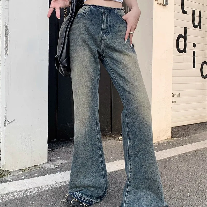 Retro Damen Frühling und Herbst gespleißt hohe Taille Knopf Reiß verschluss Tasche modische lose drapieren weites Bein zerlumpte Kante Jeans