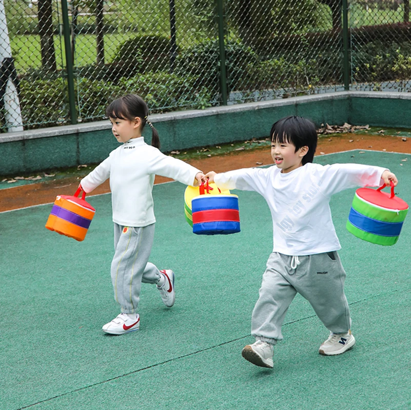 Rueda de arcoíris para jardín de infantes, estaca de ciruela multifuncional, sujeción de piernas para niños, salto de rana, transporte, equipo de adiestramiento al aire libre