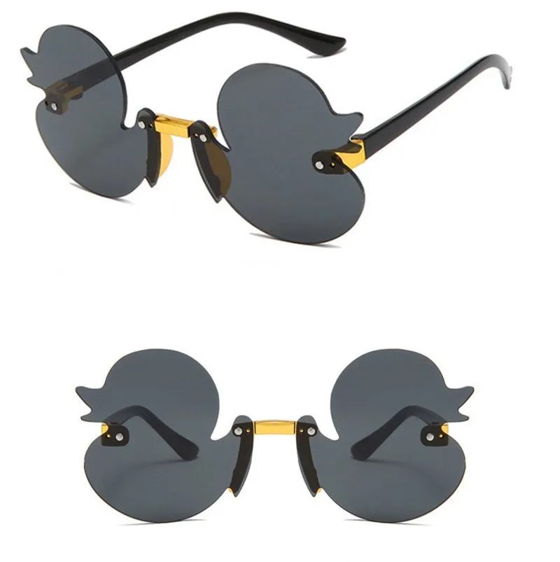 Megmunkalás children's sunglass Perem nélküli Gúnyrajz Ruca Alak Napellenző anti-ultraviolet szemüvegek Estély decorativa szemüvegek számára Gyermek gyerekeknek